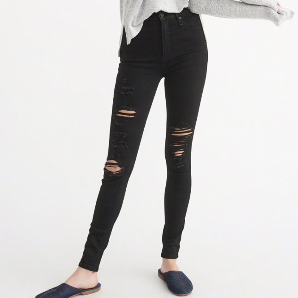 Destroyed raw hem button fly high rise jeans